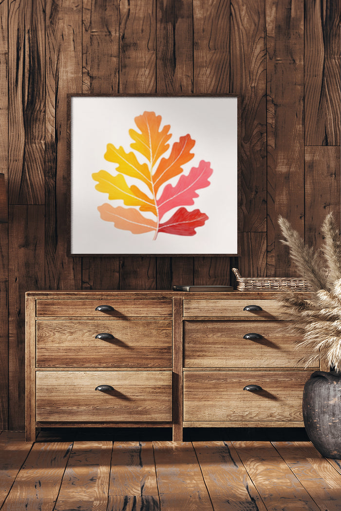 Gradient colorful oak leaf poster mounted on wood panel wall above wooden dresser