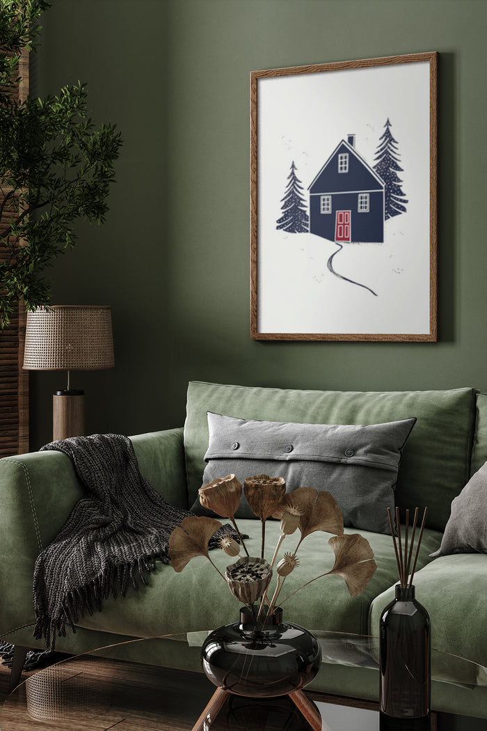 Framed poster of a cozy cabin with snowy pine trees in a stylish living room setting