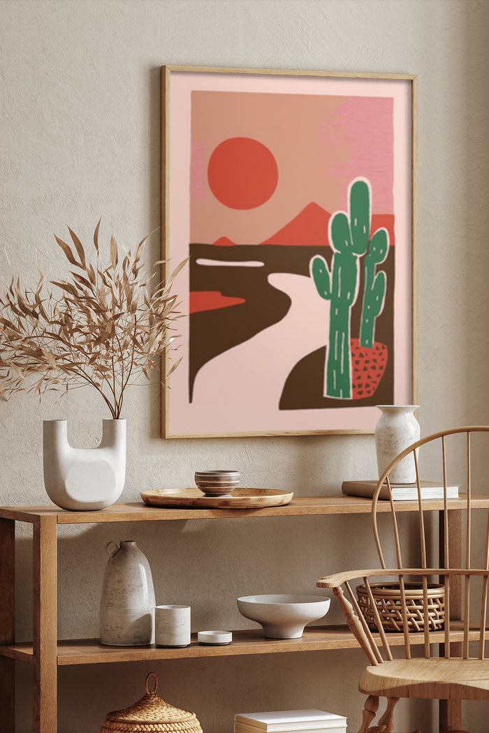 Modern desert sunset artwork with cactus illustration poster in interior setting