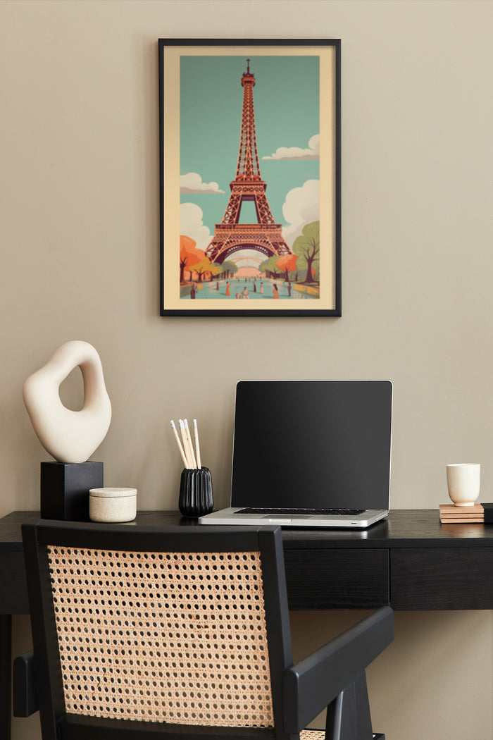 Stylized Eiffel Tower poster in a home office setting above a desk with a laptop