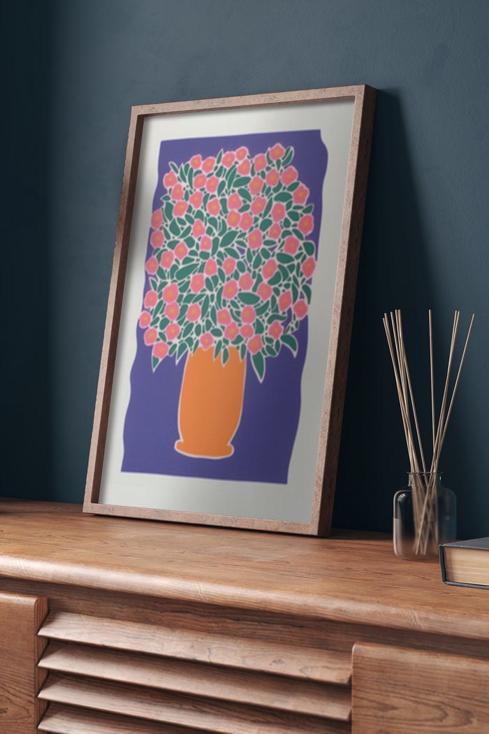 Modern floral artwork poster featuring pink flowers in an orange vase displayed in a room