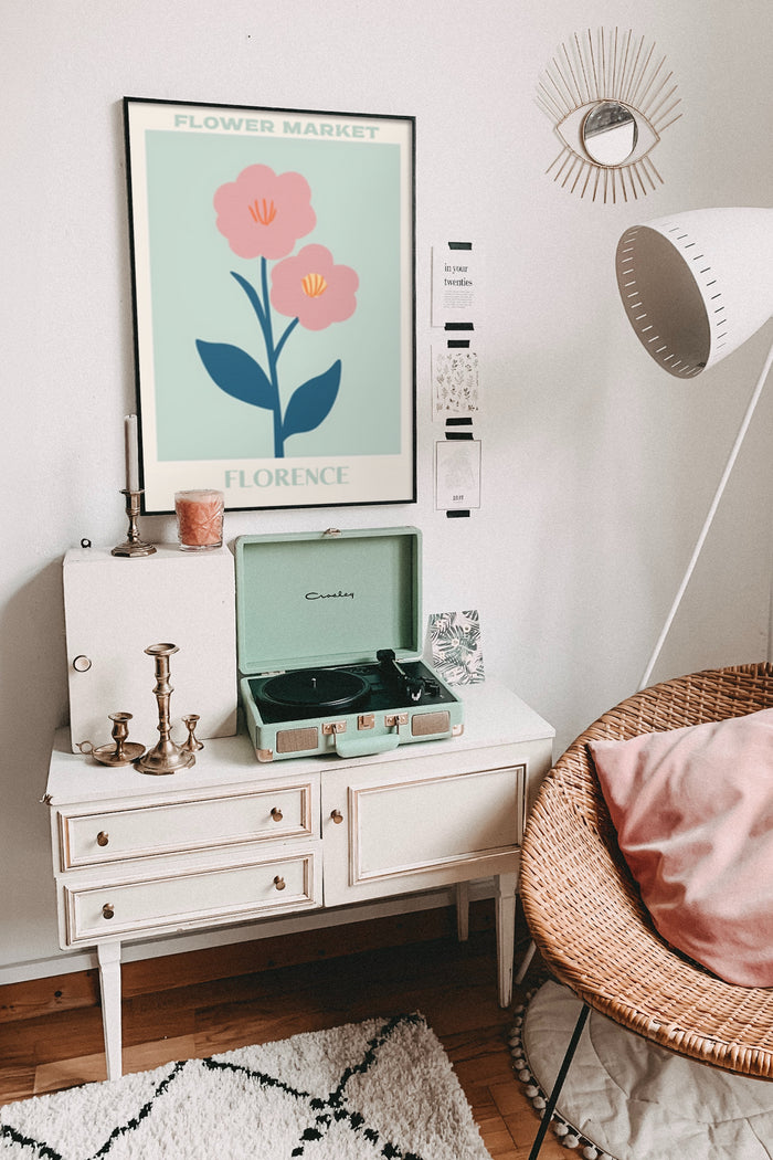 Vintage Florence Flower Market poster featuring pink flowers in a stylish room with record player and woven chair