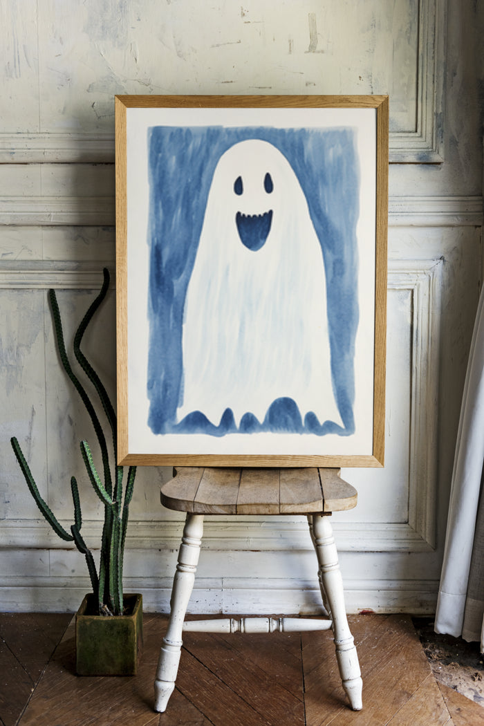 Cheerful ghost painting on wooden easel in a vintage room setting with cactus plant