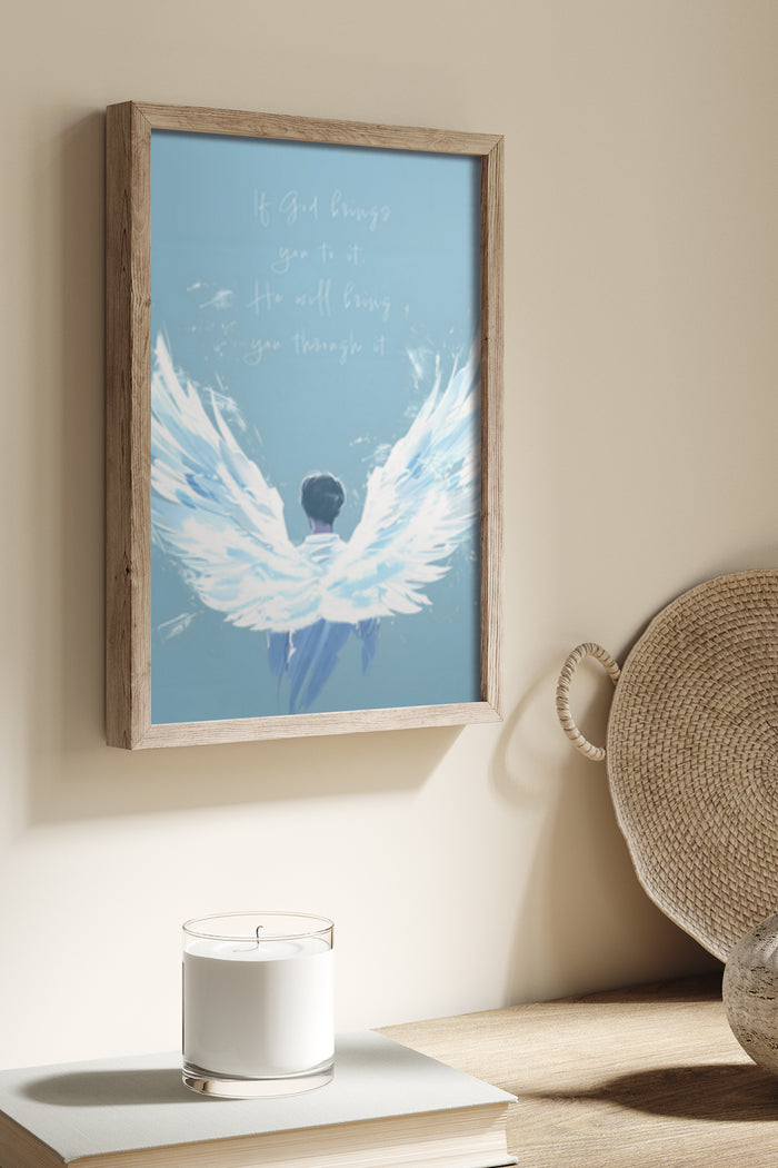 Inspirational poster featuring angel wings and quote 'If God brings you to it. He will bring you through it' in a wooden frame