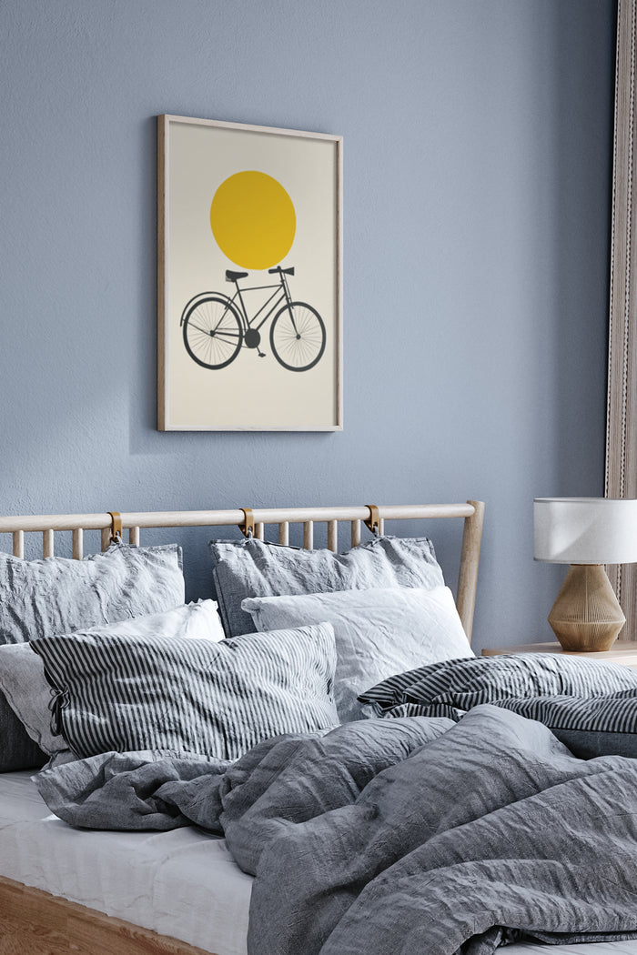 Minimalist bicycle with yellow circle poster framed on a bedroom wall