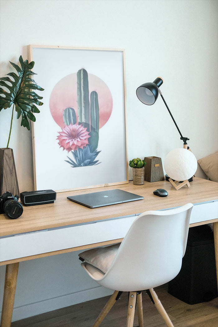 Minimalist cactus with pink flower and sunset background poster in a modern home office setup