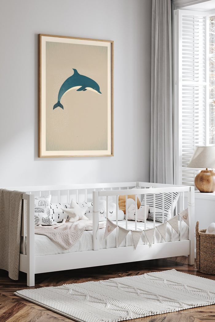Minimalist dolphin poster art framed in a nursery room with cozy crib and decor