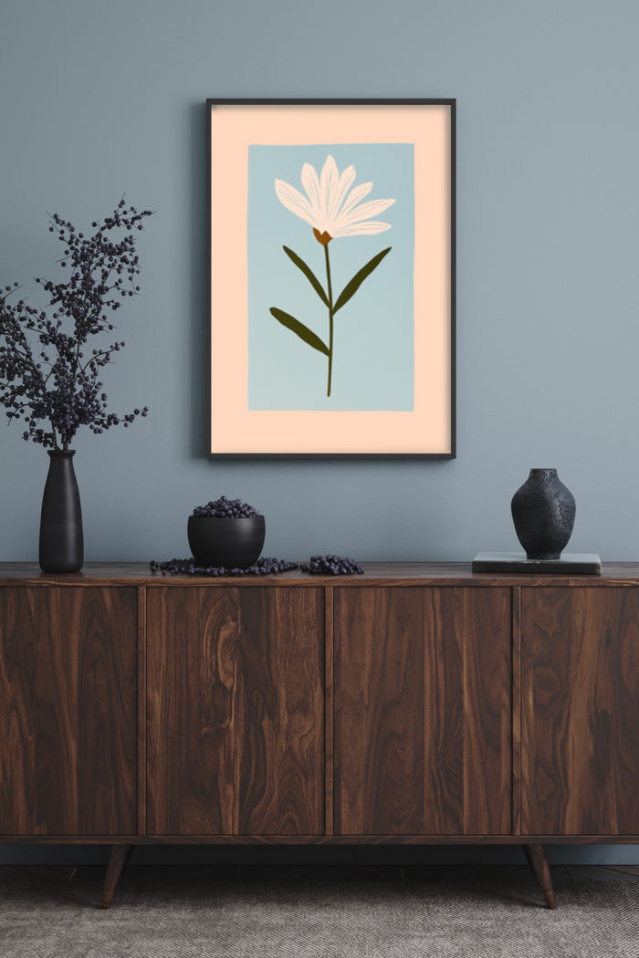 Minimalist white flower poster framed in a modern living room setting above a wooden sideboard