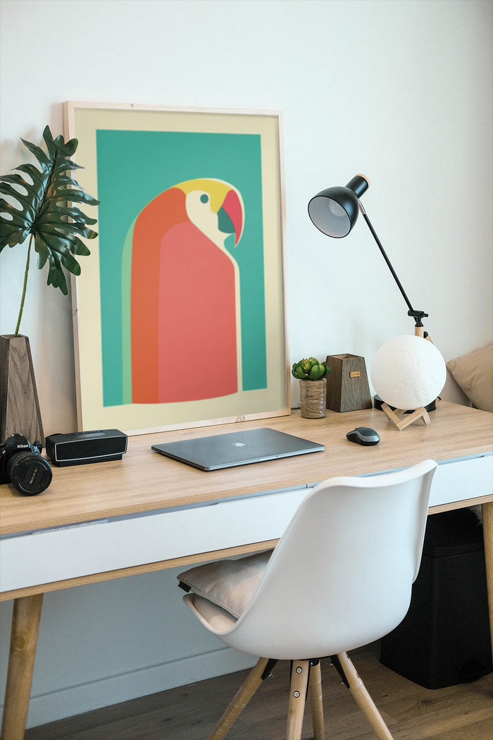 Minimalist style parrot poster framed on the wall above a home office desk with modern decor