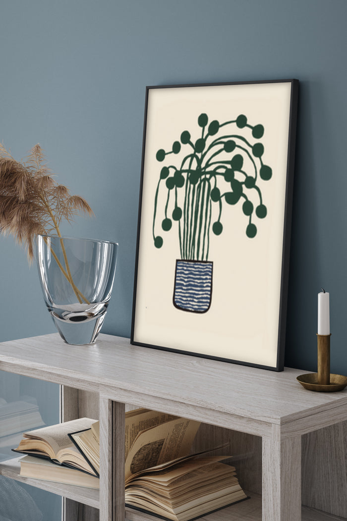 Modern minimalist artwork of a green plant in a striped pot displayed in a contemporary room setting