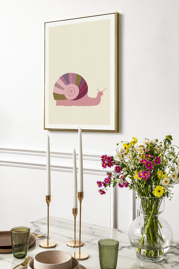 Minimalist snail illustration poster framed on a white wall above a modern dining setting