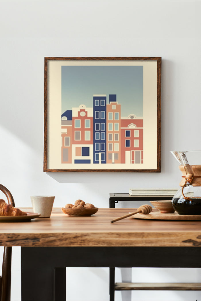 Framed abstract cityscape poster in a modern home setting with coffee and croissants on a wooden table