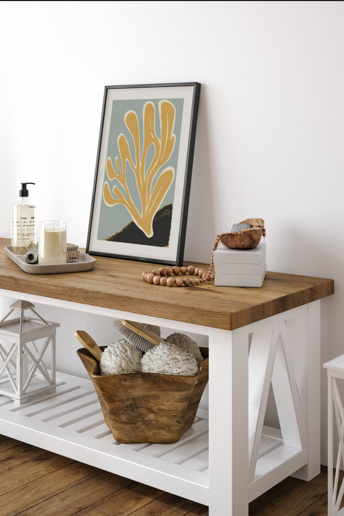 Modern abstract coral design poster framed and displayed on a wooden console table in a stylish interior