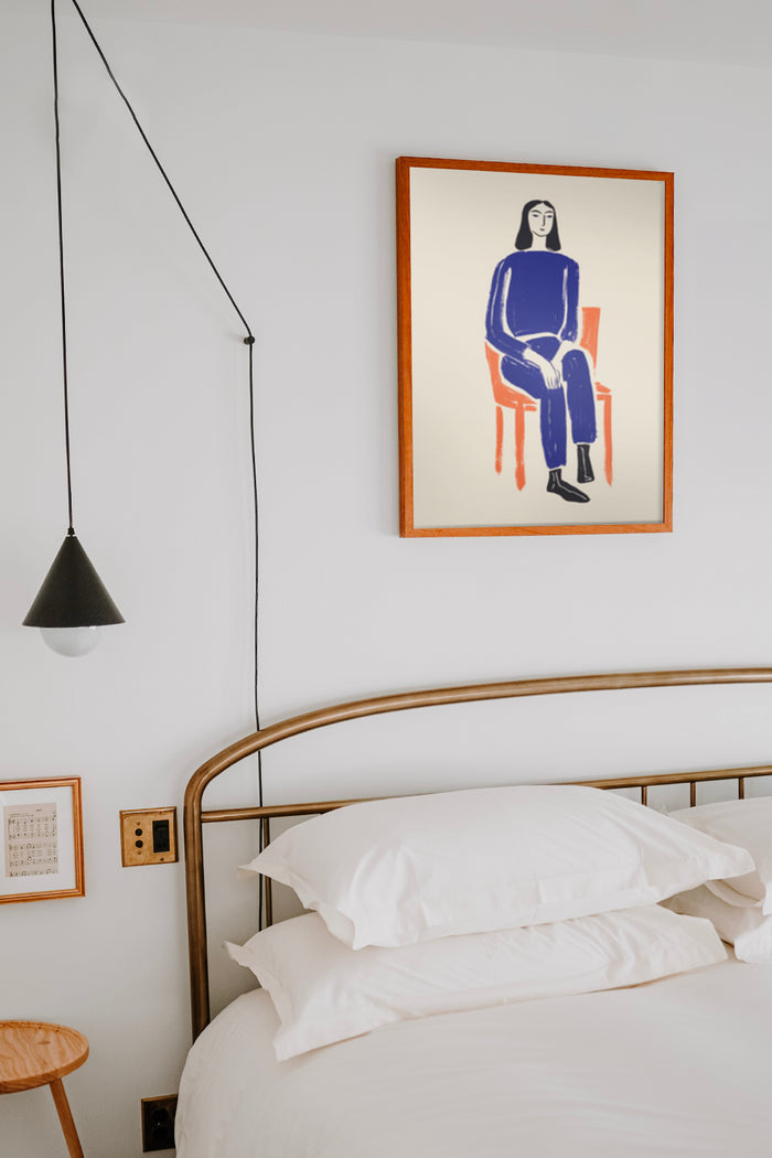 Contemporary abstract figure painting in wooden frame over a bed with white bedding and a minimalist bedside lamp