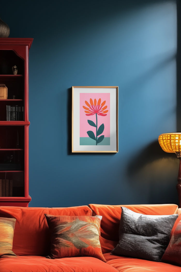 Abstract orange flower artwork poster on blue wall above red sofa in stylish interior design