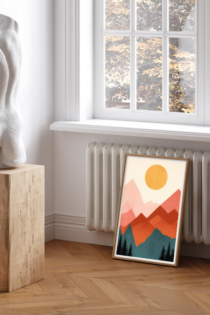 Contemporary abstract mountain landscape poster leaning against wall in stylish room decor