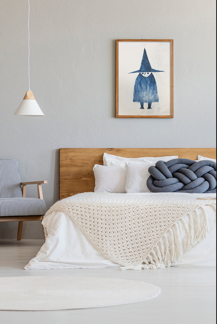 Stylish bedroom interior design with a whimsical witch character artwork in a frame on the wall