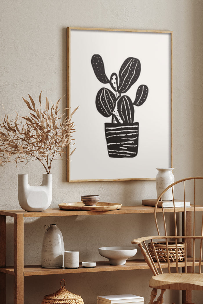 Modern monochrome cactus artwork poster in a contemporary home interior setting