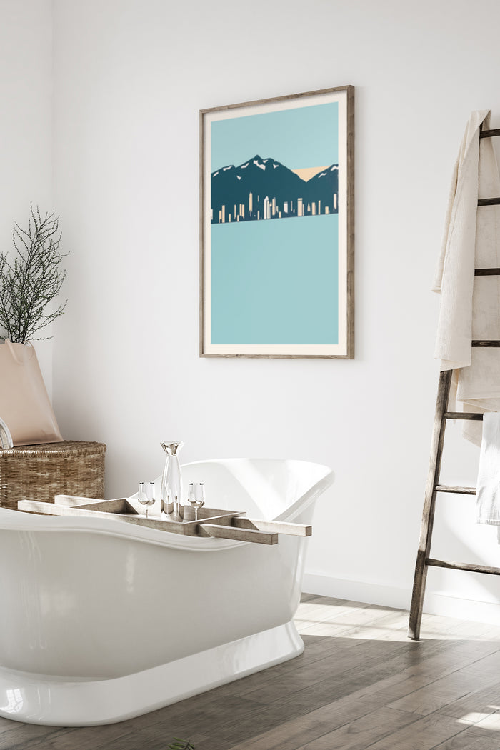 Contemporary city skyline and mountain range poster displayed above bathtub in a modern bathroom interior