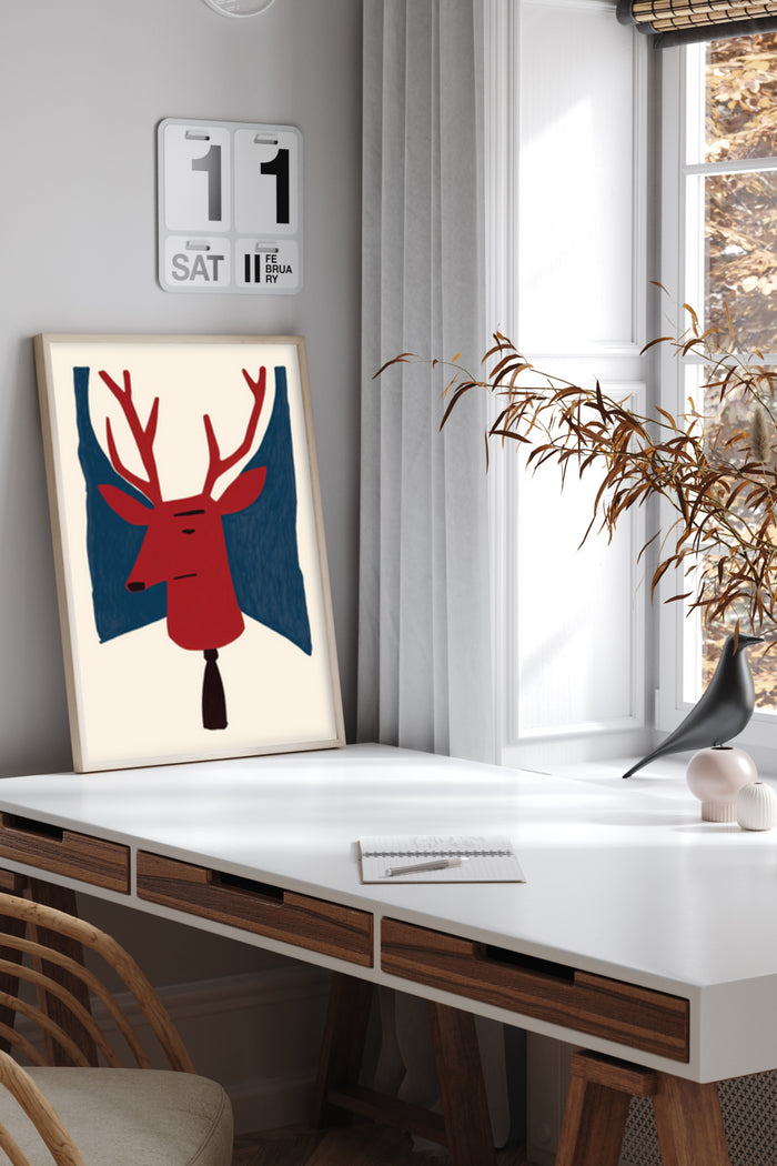 Modern abstract deer artwork poster in a home office setting