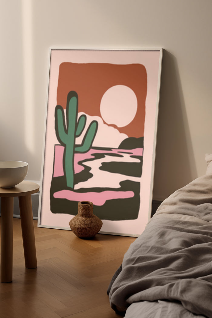 Modern desert landscape art poster with cactus and setting sun in stylish bedroom decor