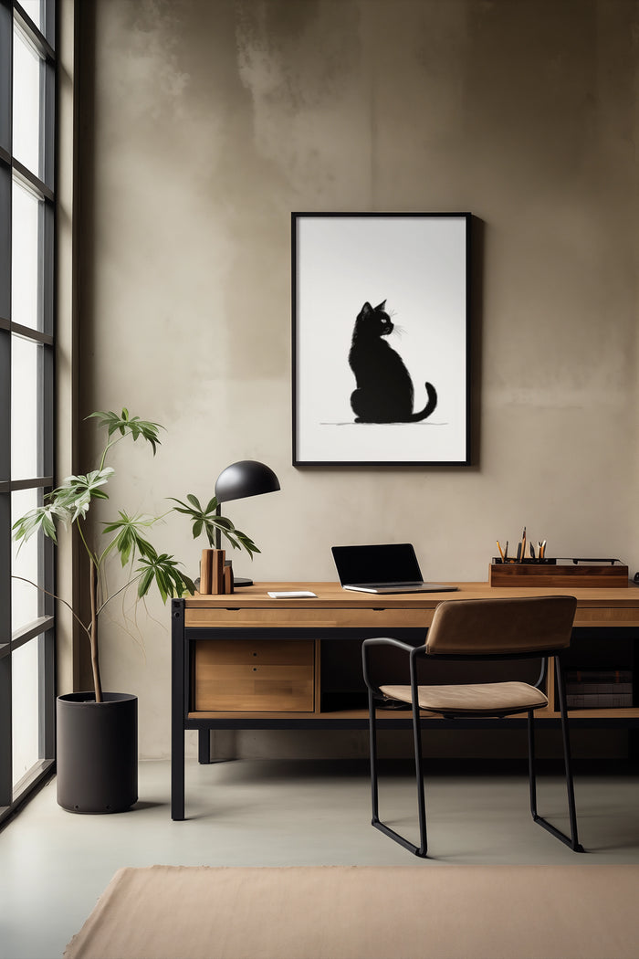 Minimalist home office with large window and black cat silhouette artwork poster on wall