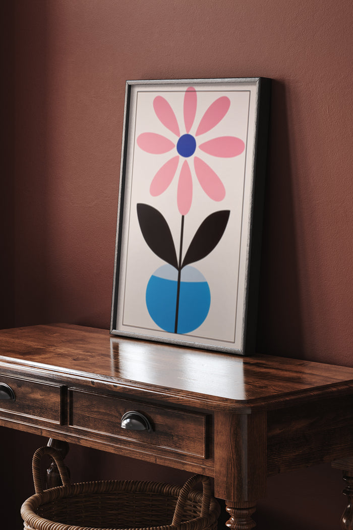 Modern Minimalist Pink Flower Artwork in a Stylish Frame Displayed on Wooden Console