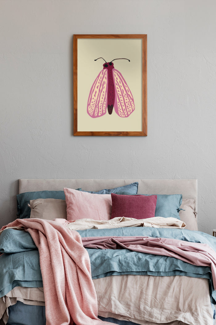 Contemporary pink moth illustration in wooden frame above bed with pastel bedding