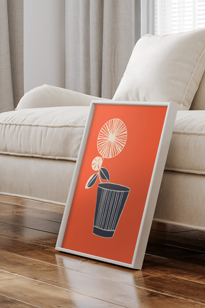 Contemporary orange and white citrus plant illustration poster framed in a living room