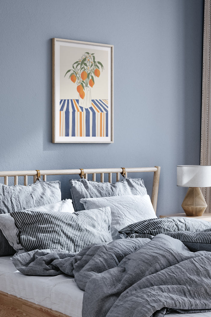 Modern bedroom interior with a framed orange fruit poster over the bed