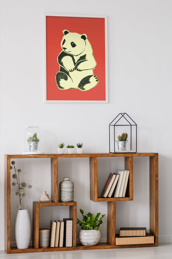 Modern stylized panda poster with red background on living room wall