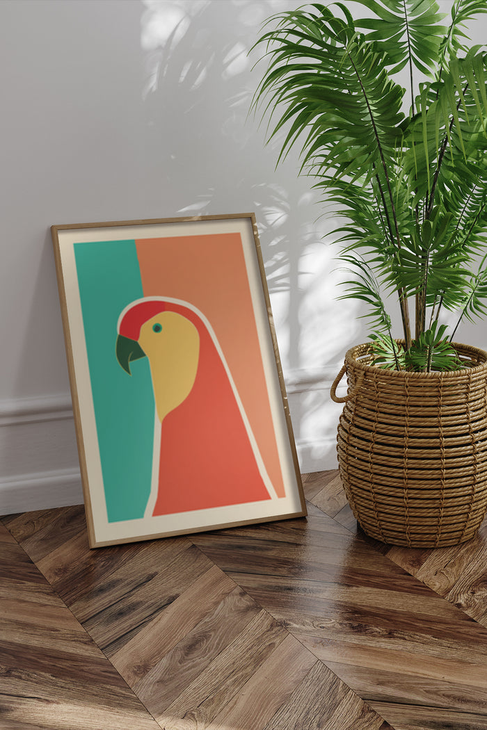 Colorful modern parrot silhouette artwork in a poster frame beside indoor palm plant
