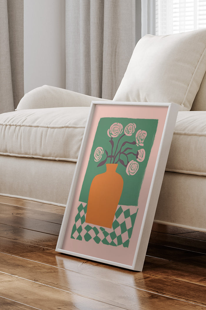 Stylish modern art poster of rose bouquet in orange vase with green backdrop framed and displayed in a cozy living room