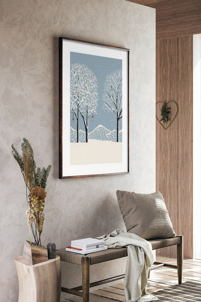 Contemporary framed poster of a winter landscape with snow-covered trees and hills, displayed in a stylish home interior