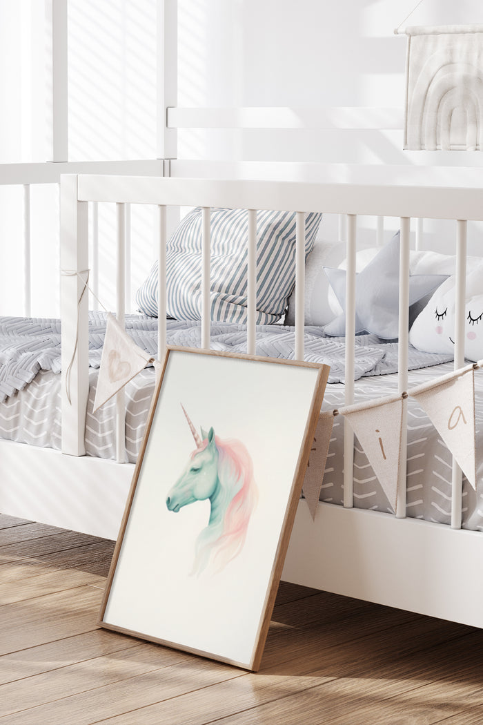 Pastel colored unicorn poster leaning against a crib in a modern nursery room interior