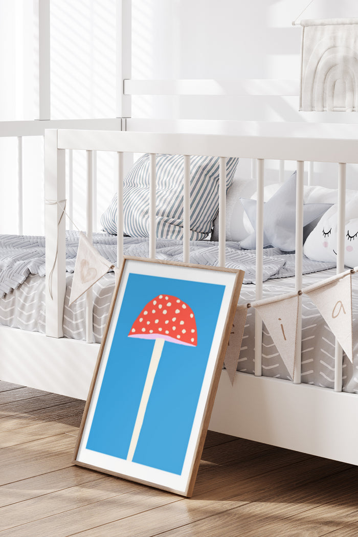 Red spotted mushroom illustration in a white frame as children's room decor