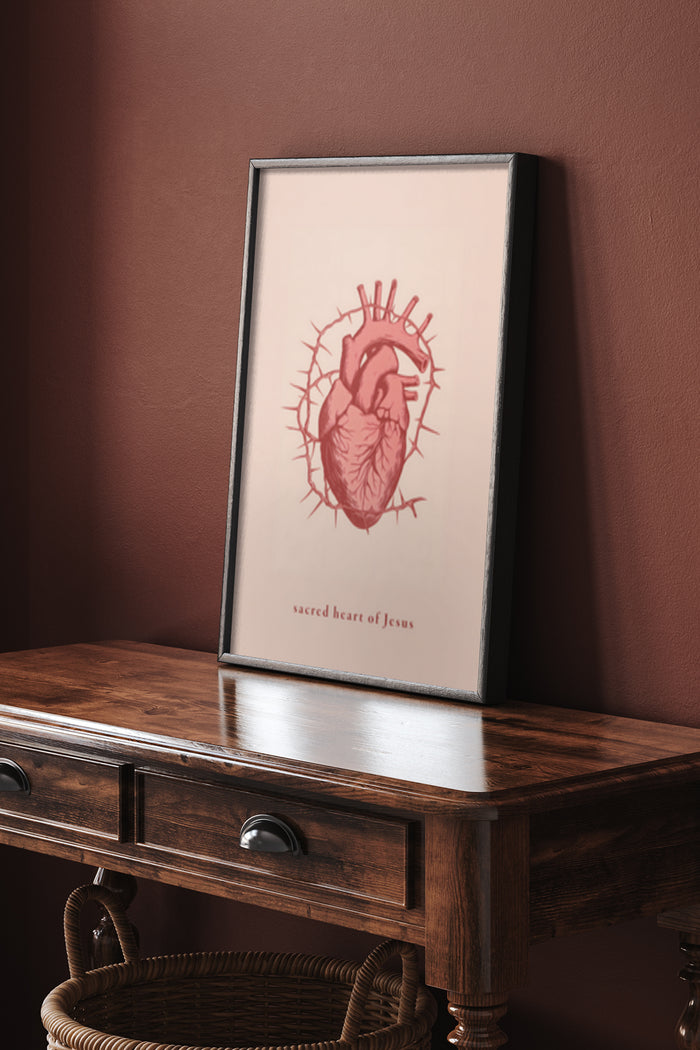 Framed Sacred Heart of Jesus artwork poster on wooden side table