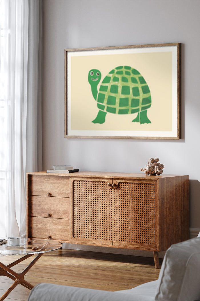 Framed poster of a smiling cartoon turtle hanging on a wall above a wooden sideboard