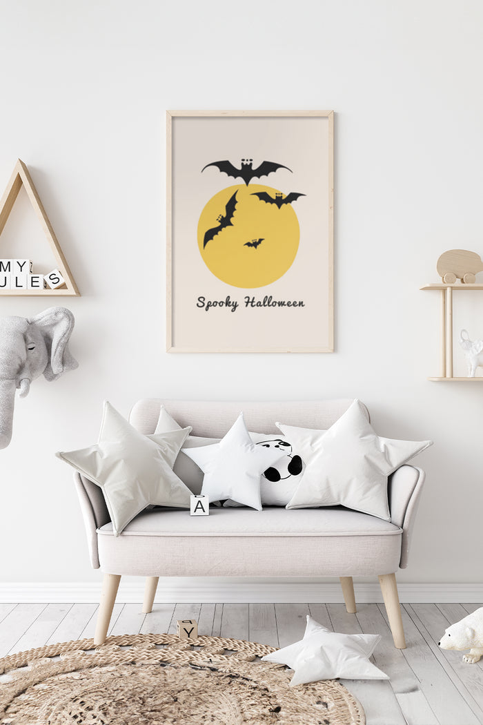Spooky Halloween poster with silhouetted bats against a full moon hanging on a wall