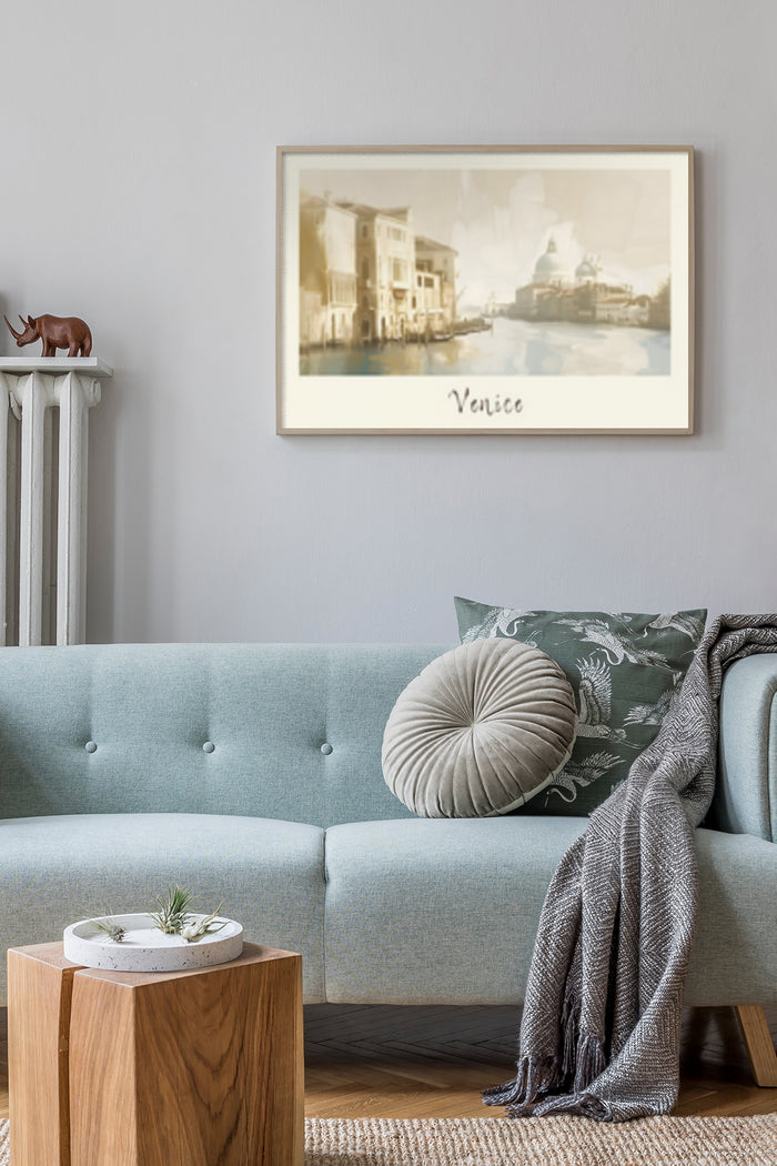 Framed vintage-style Venice poster above a sofa in a modern living room setting