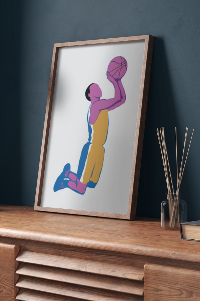 Vintage style illustration of a basketball player shooting on a poster framed on a wooden sideboard