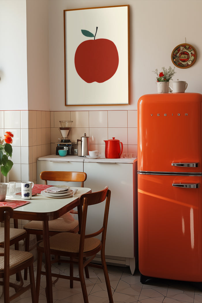 Vintage style kitchen with a retro red refrigerator and a minimalist apple poster hanging on the wall