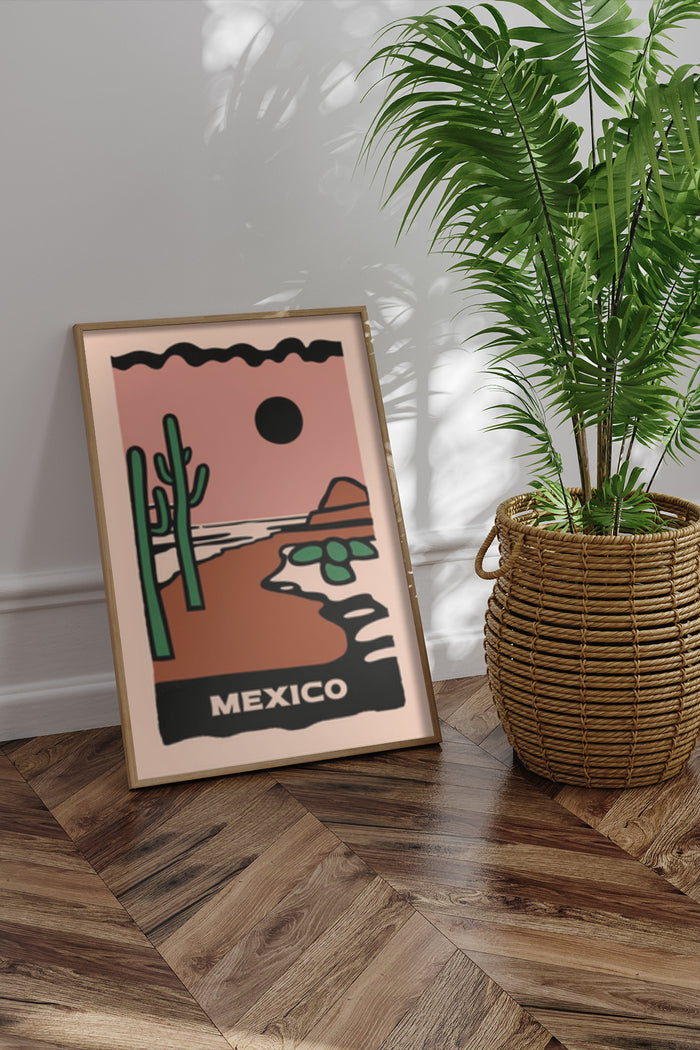 Vintage-styled Mexico travel poster featuring cactus and sun in a frame next to a potted palm tree