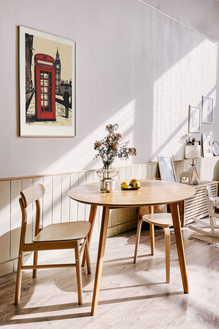 Stylish interior with vintage London red telephone booth poster on wall