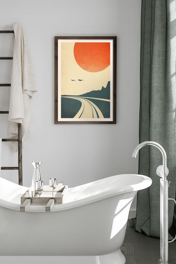 Vintage sunrise landscape poster with oversized sun and curved road hanging in modern bathroom setting