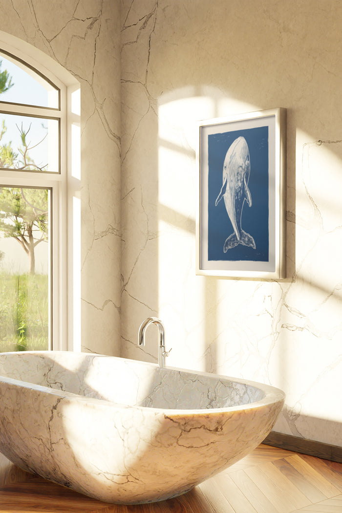 Vintage blue whale illustration poster mounted on a bathroom wall beside an elegant stone bathtub