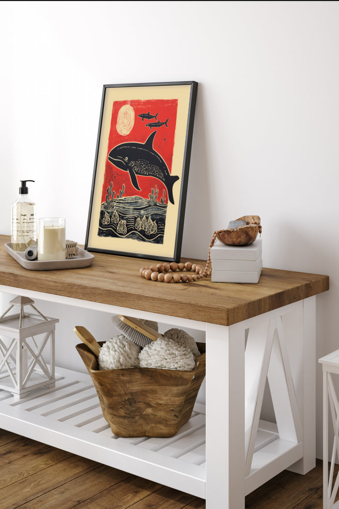 Vintage red and navy whale illustration poster in modern interior setting