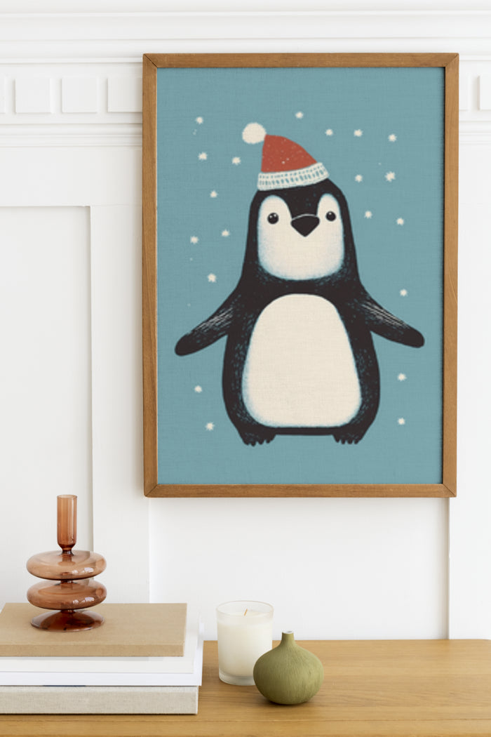 Framed poster of a cute penguin wearing a Santa hat with a snowy background displayed in a cozy room setting