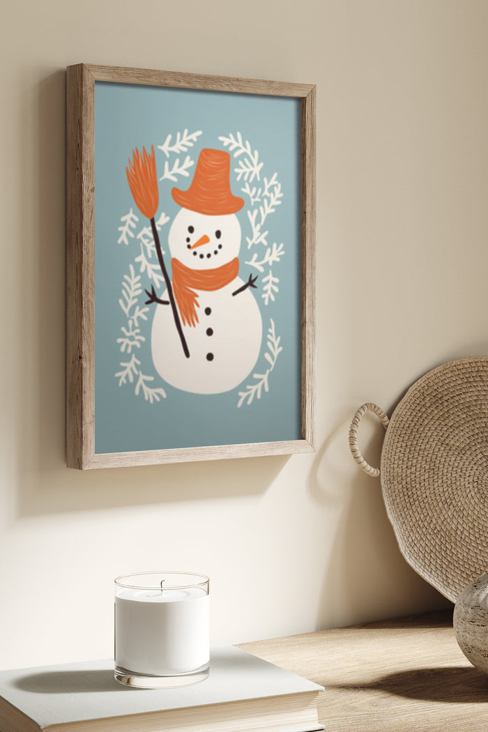 Winter themed framed poster of a cheerful snowman with an orange hat and scarf surrounded by snowflakes