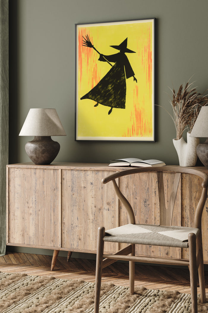 Modern witch silhouette poster with vibrant yellow and orange gradient background in stylish room decor